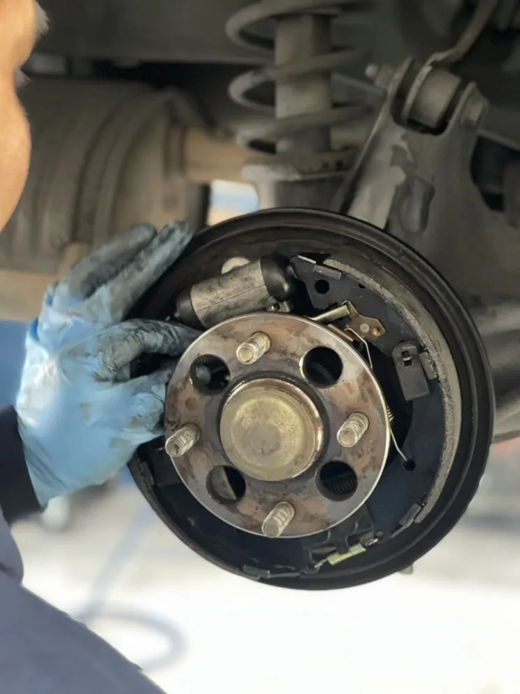 A rear drum brake opened up for inspection
